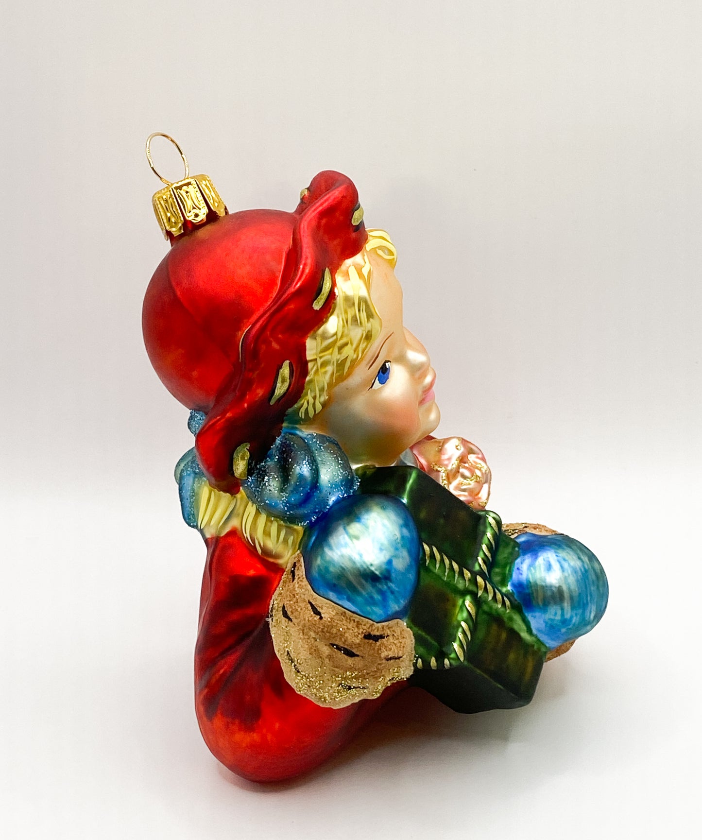 Baumschmuck-Christbaumschmuck-maedchen-bueste-roter-hut-geschenk-mostowski-komozja-weihnachts-deko-ch-Galerie-Luechinger2