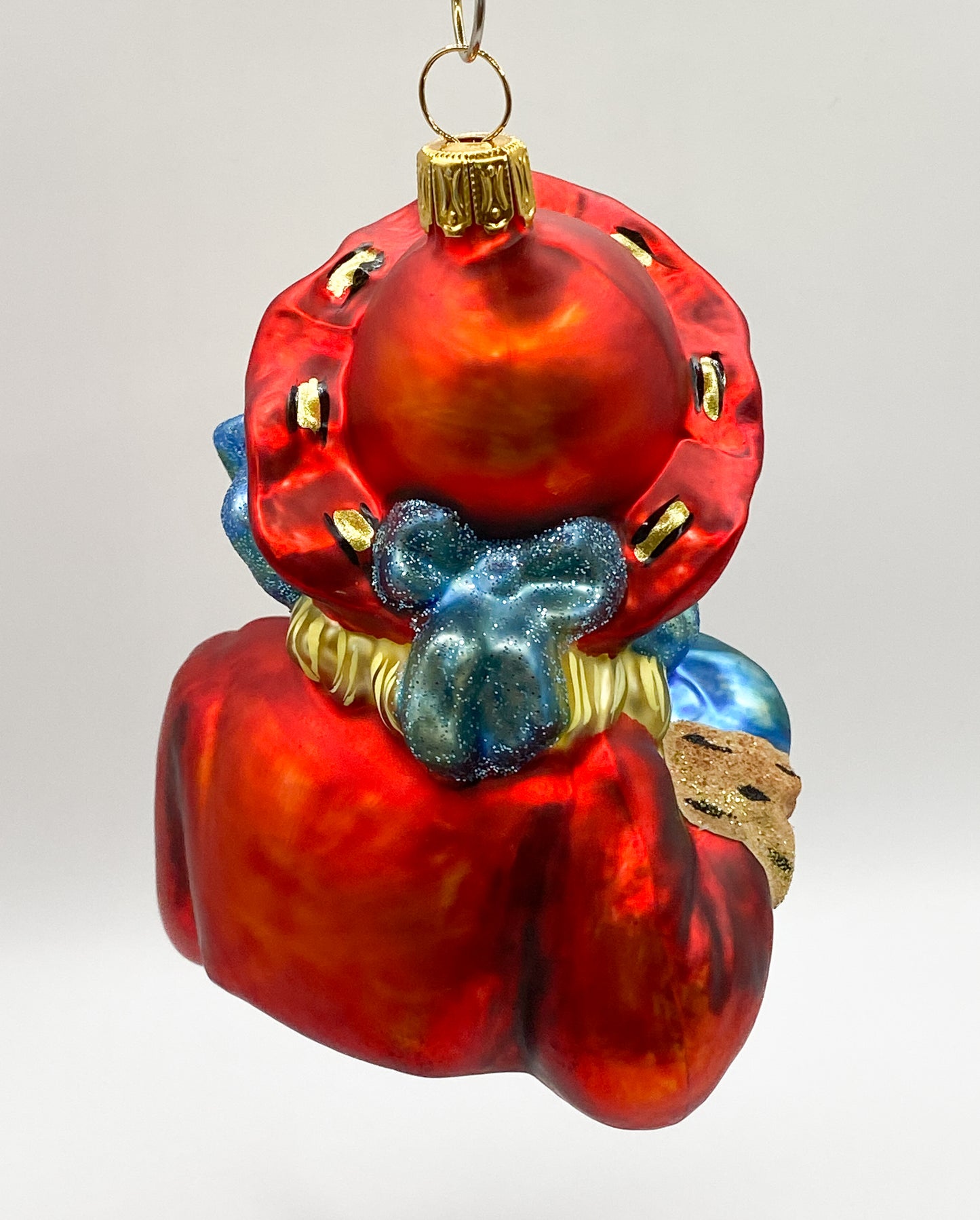 Baumschmuck-Christbaumschmuck-maedchen-bueste-roter-hut-geschenk-mostowski-komozja-weihnachts-deko-ch-Galerie-Luechinger4