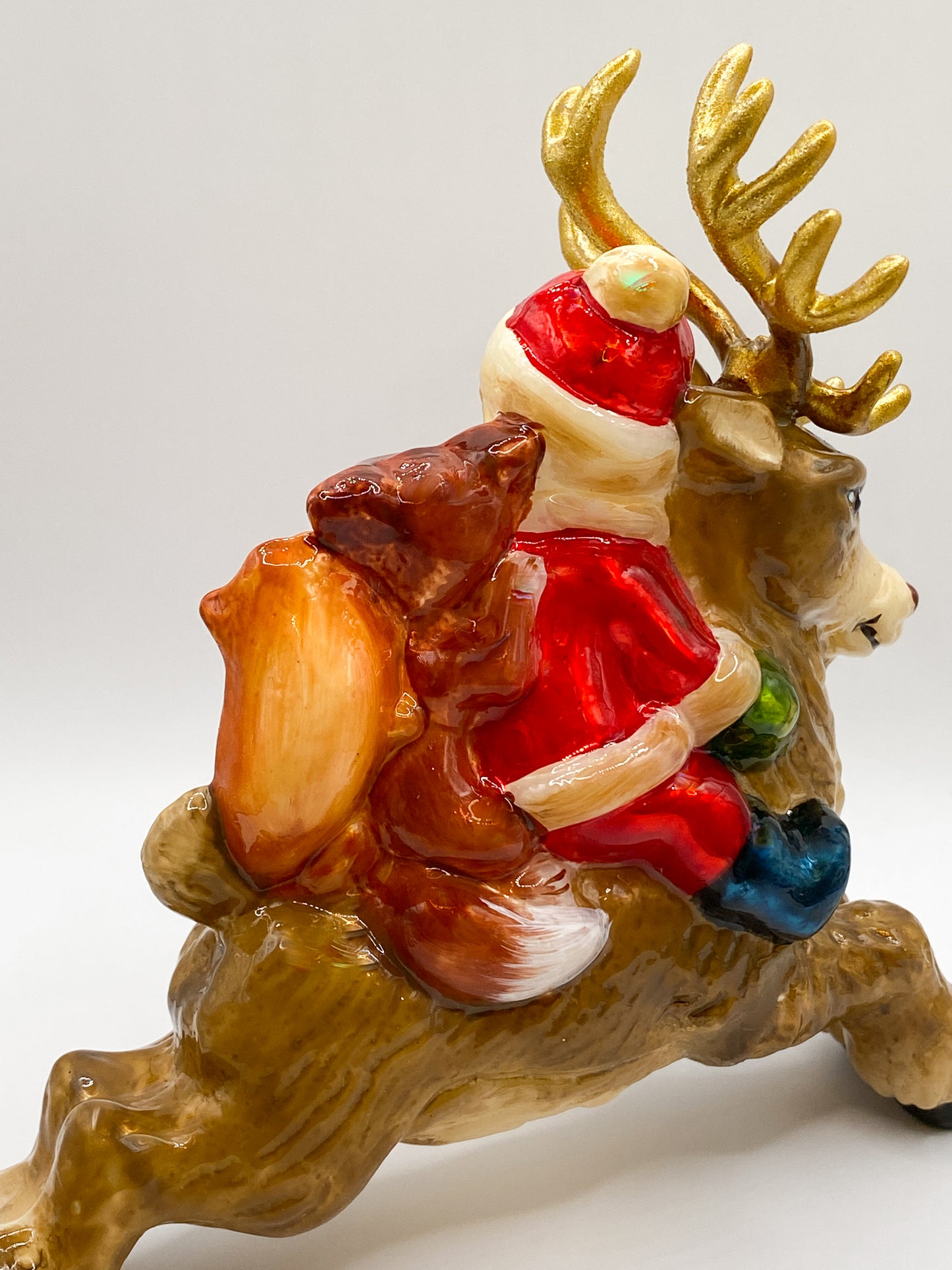 Baumschmuck-Christbaumschmuck-rentier-kind-santakostuem-fuchs-eichhoernchen-mostowski-komozja-weihnachts-deko-ch-Galerie-Luechinger4