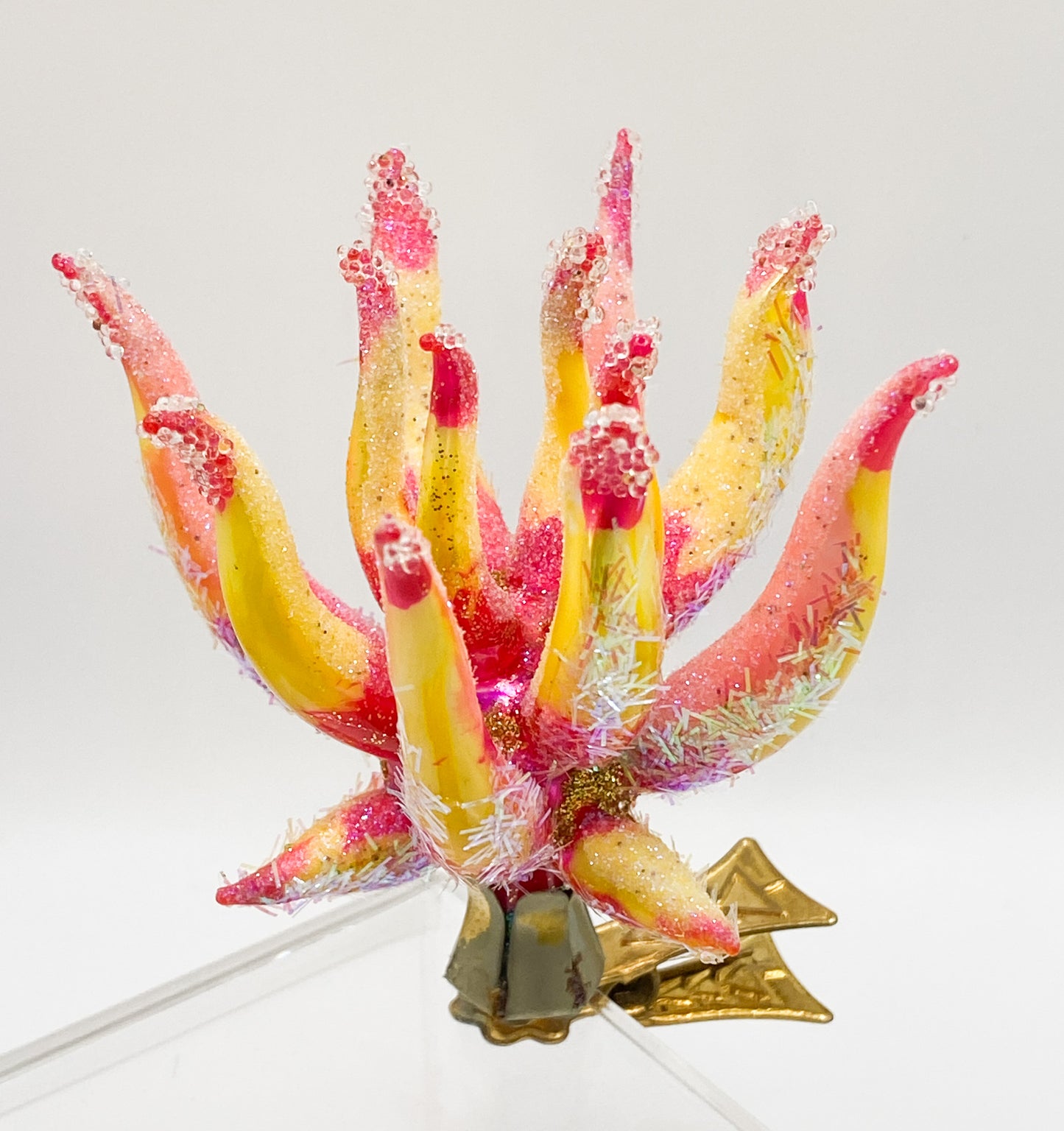 Exotic, filigree flower on clip
