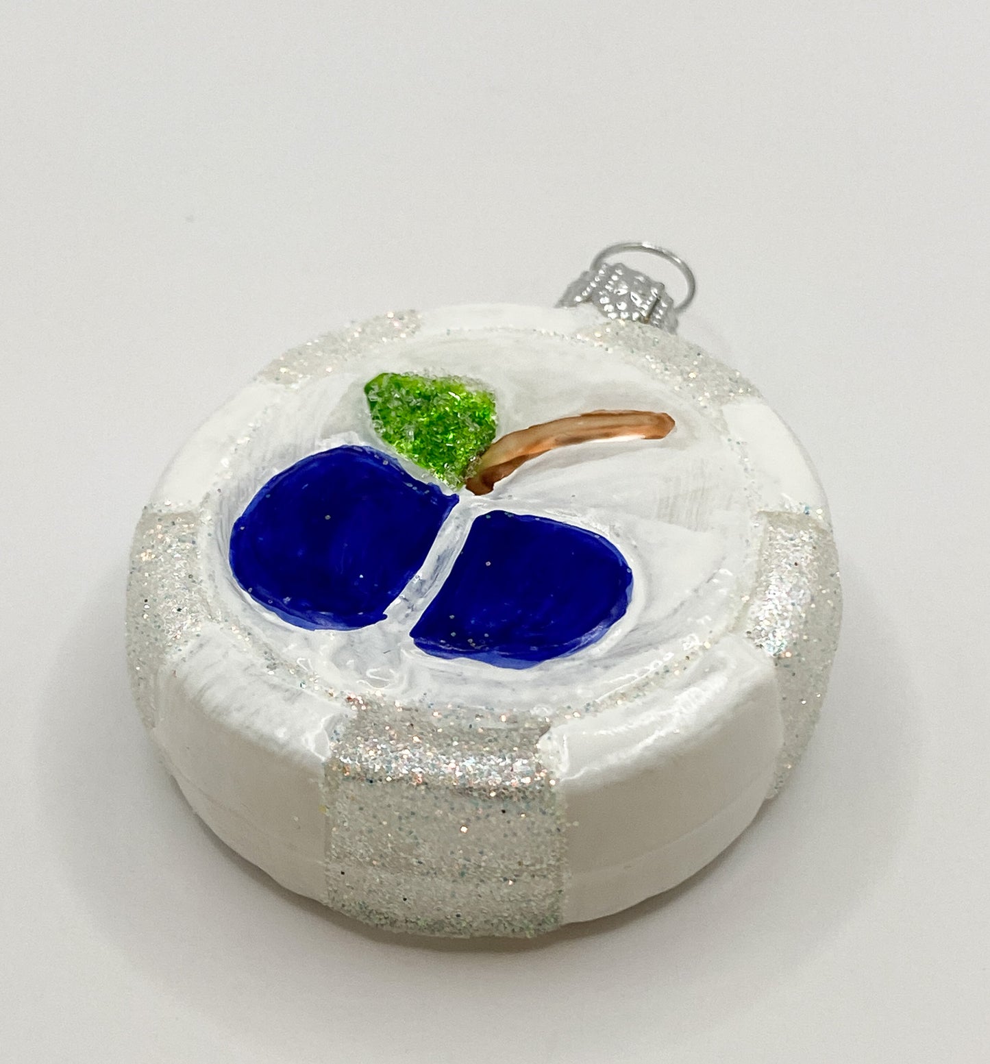 White candy with apple motif