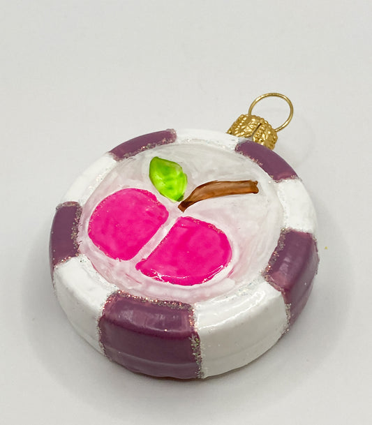 Bonbon mit pinkem Apfel-Motiv