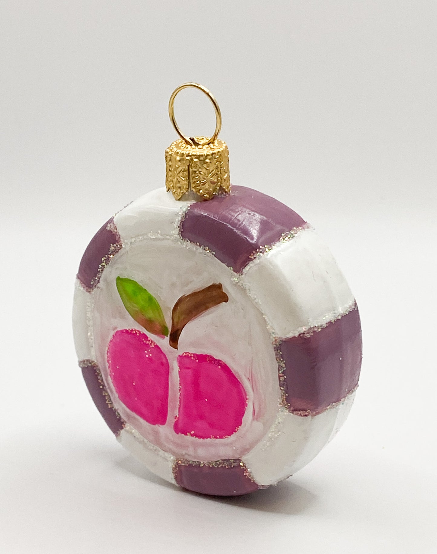 Bonbon mit pinkem Apfel-Motiv