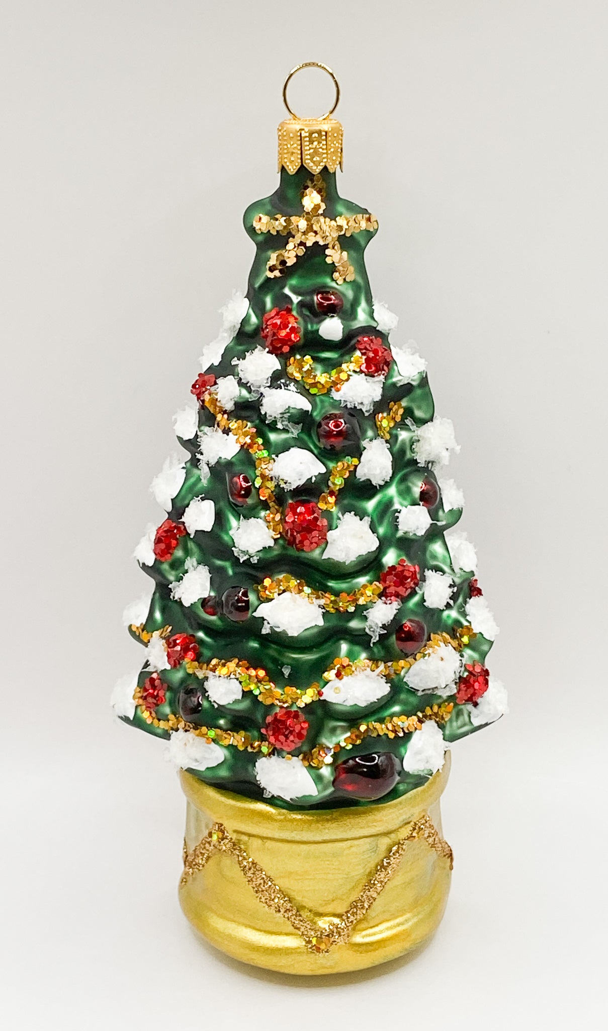 Christbaum im goldenen Topf
