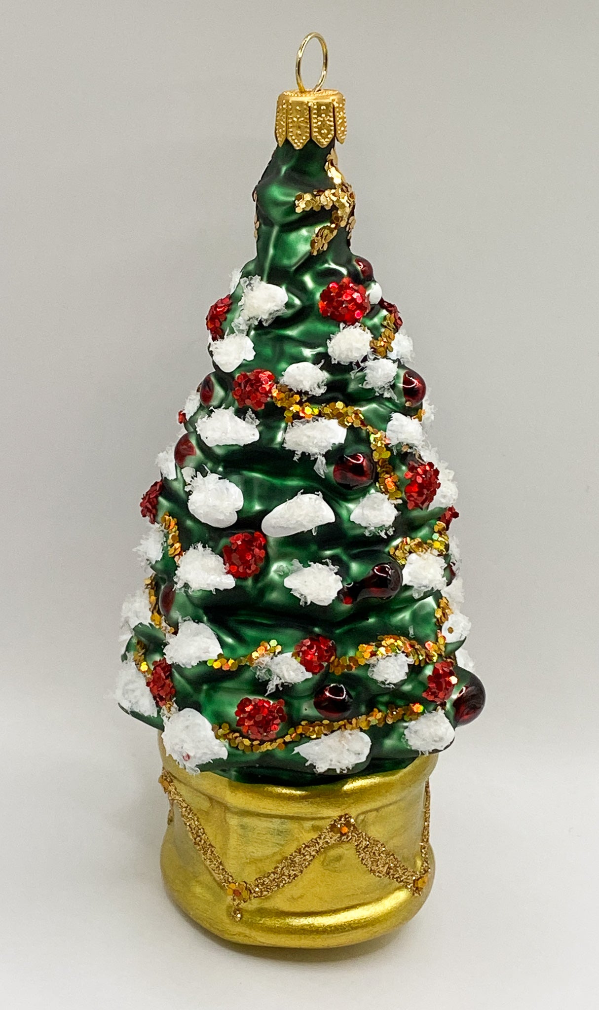 Christbaum im goldenen Topf