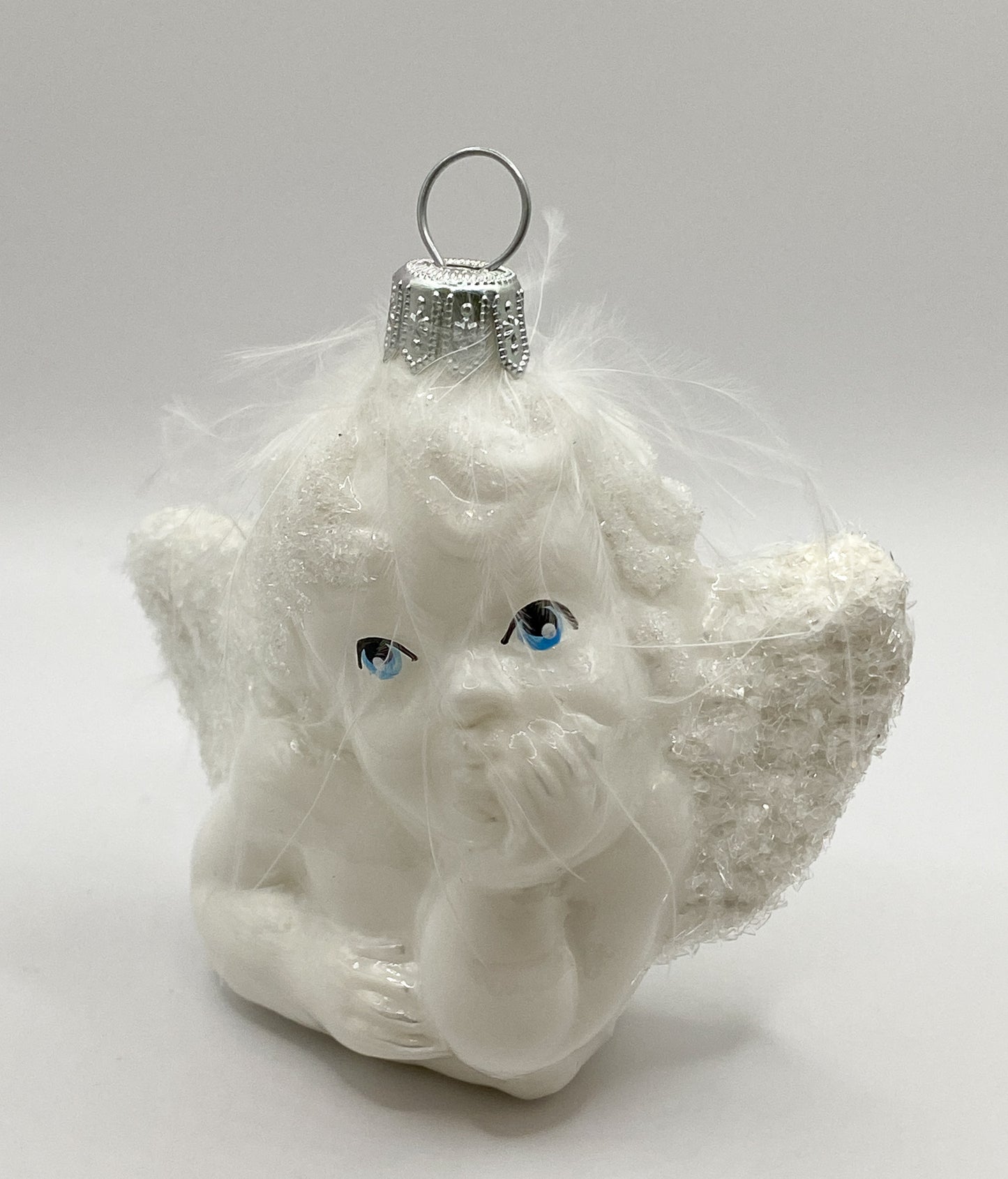 Putto pondering in shiny white with glittering wings, Raffael Angel