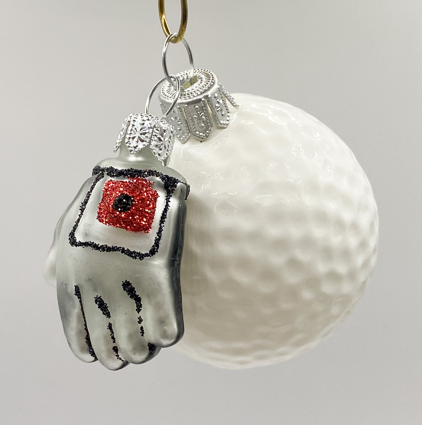 Golfball mit Handschuh