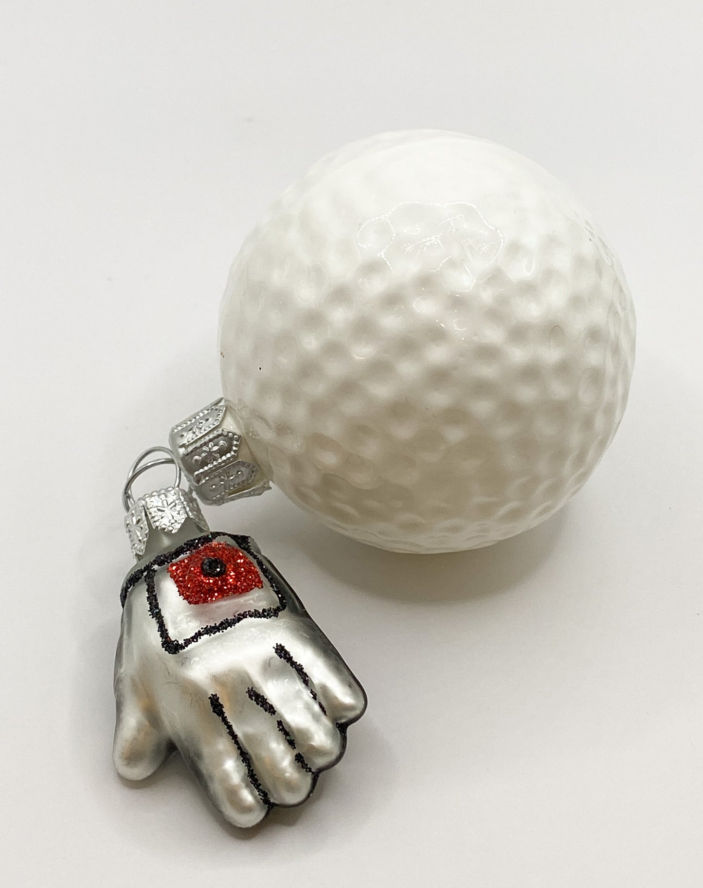 Golfball mit Handschuh
