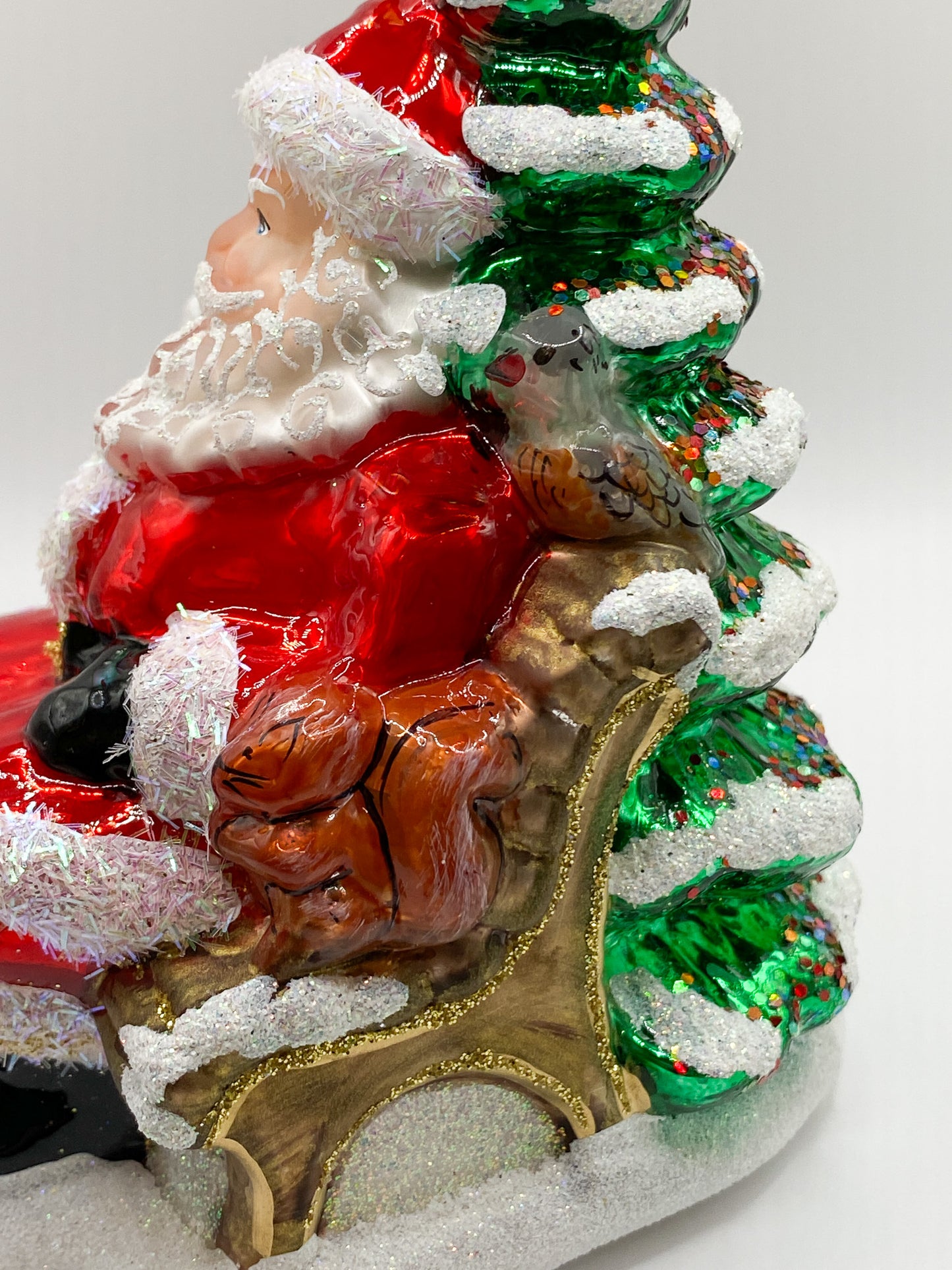 Santa on the park bench with the forest animals