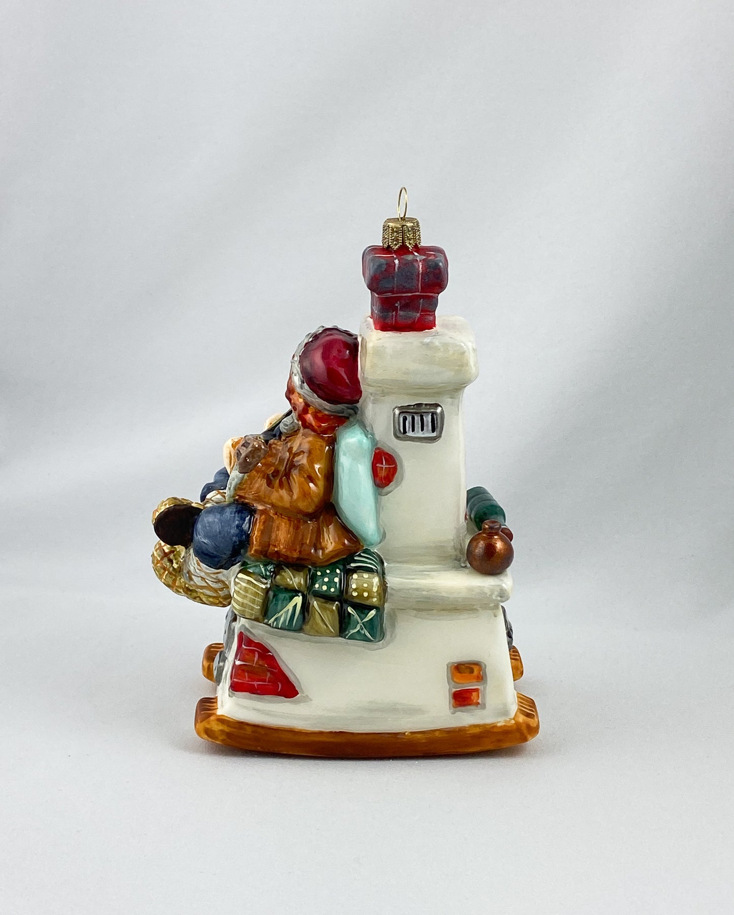 Emil sits on the stove bench and plays the balalaika, AtlasArt