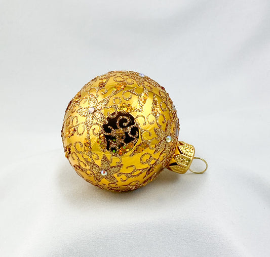 Kugel gold glanz mit goldenem Kringel Muster