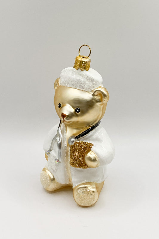 Teddybär im Arzt-Kittel mit Stethoskop