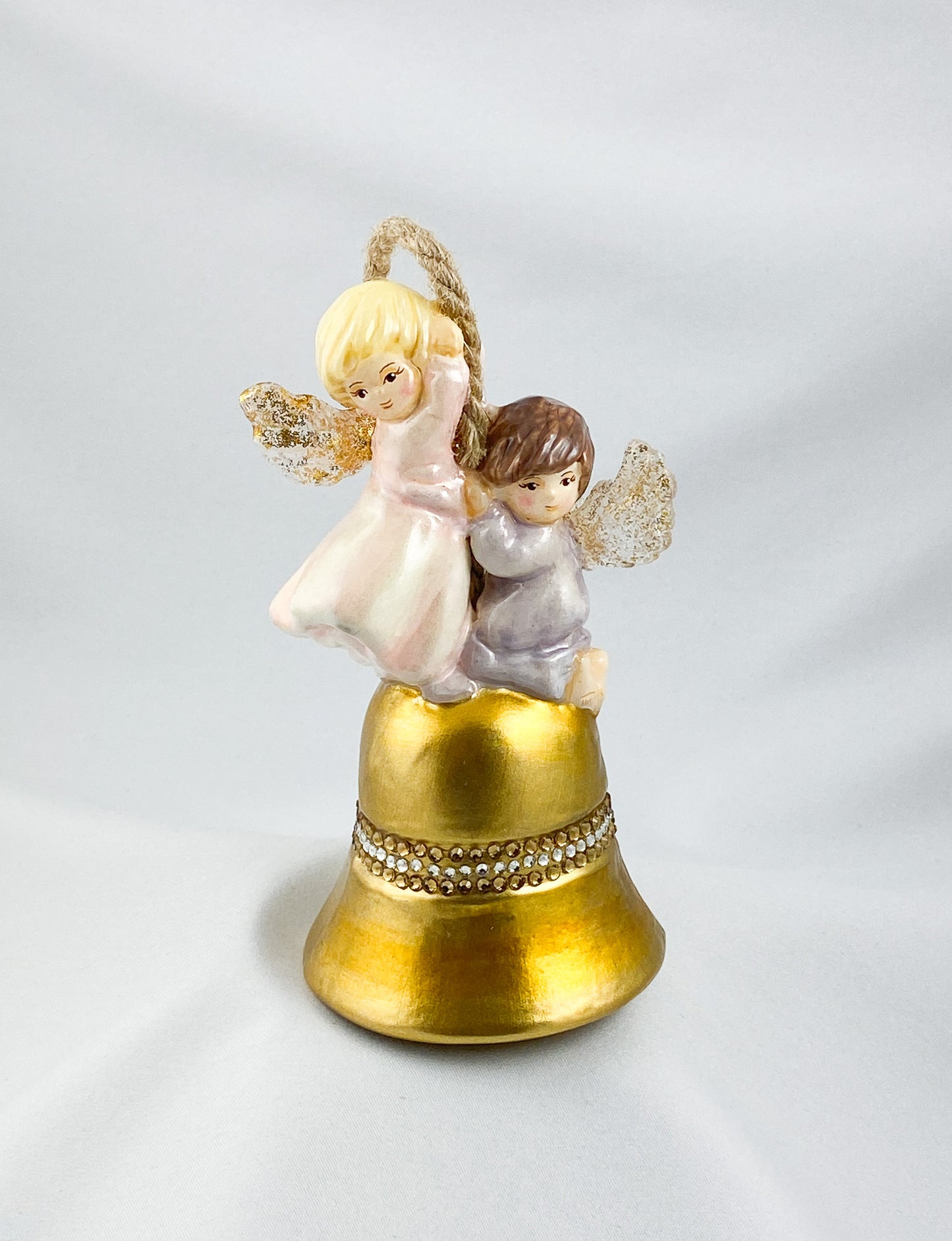 Two angels ring the golden bell, AtlasArt