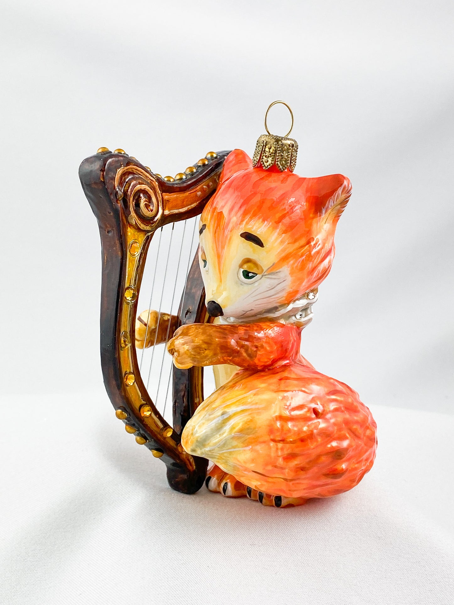 The little fox plays the harp, AtlasArt