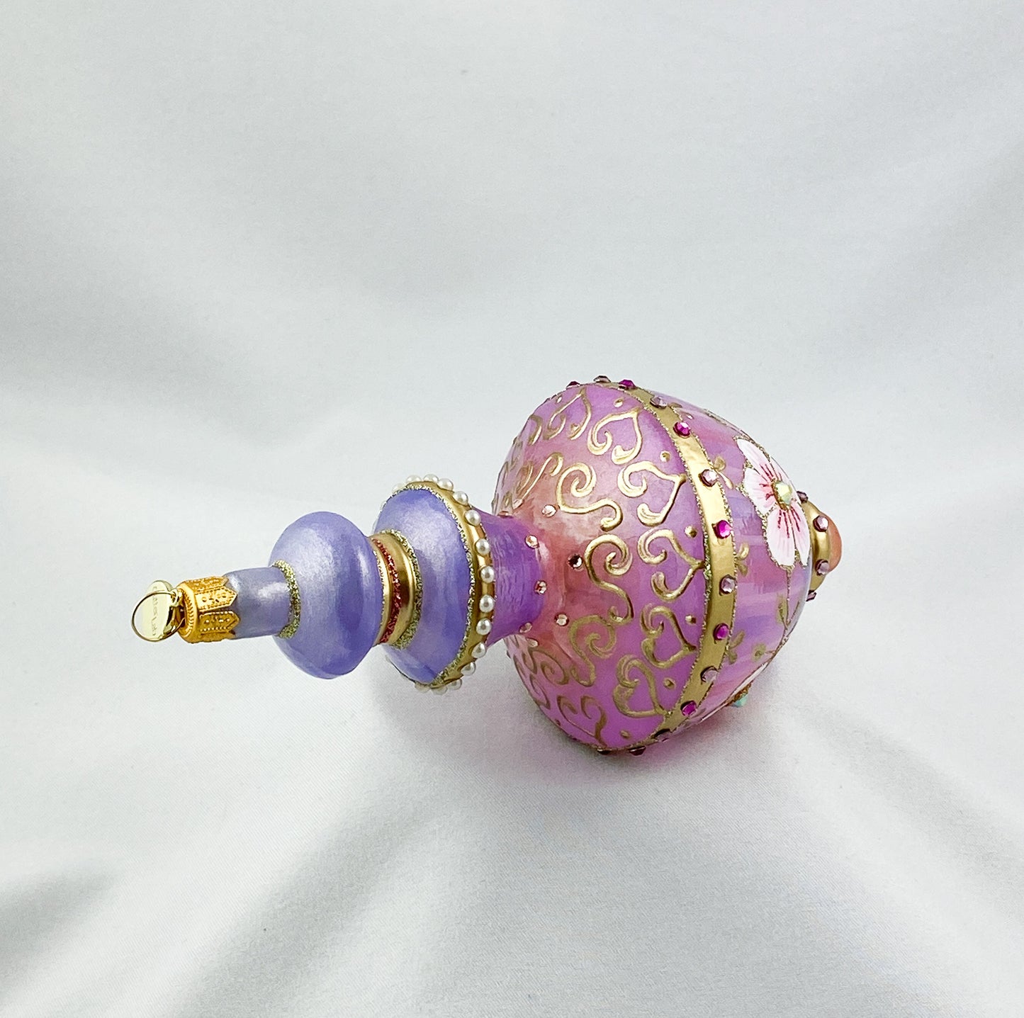 Hourglass shape in lavender and purple with pink flowers and glitter stones, GlitterLab