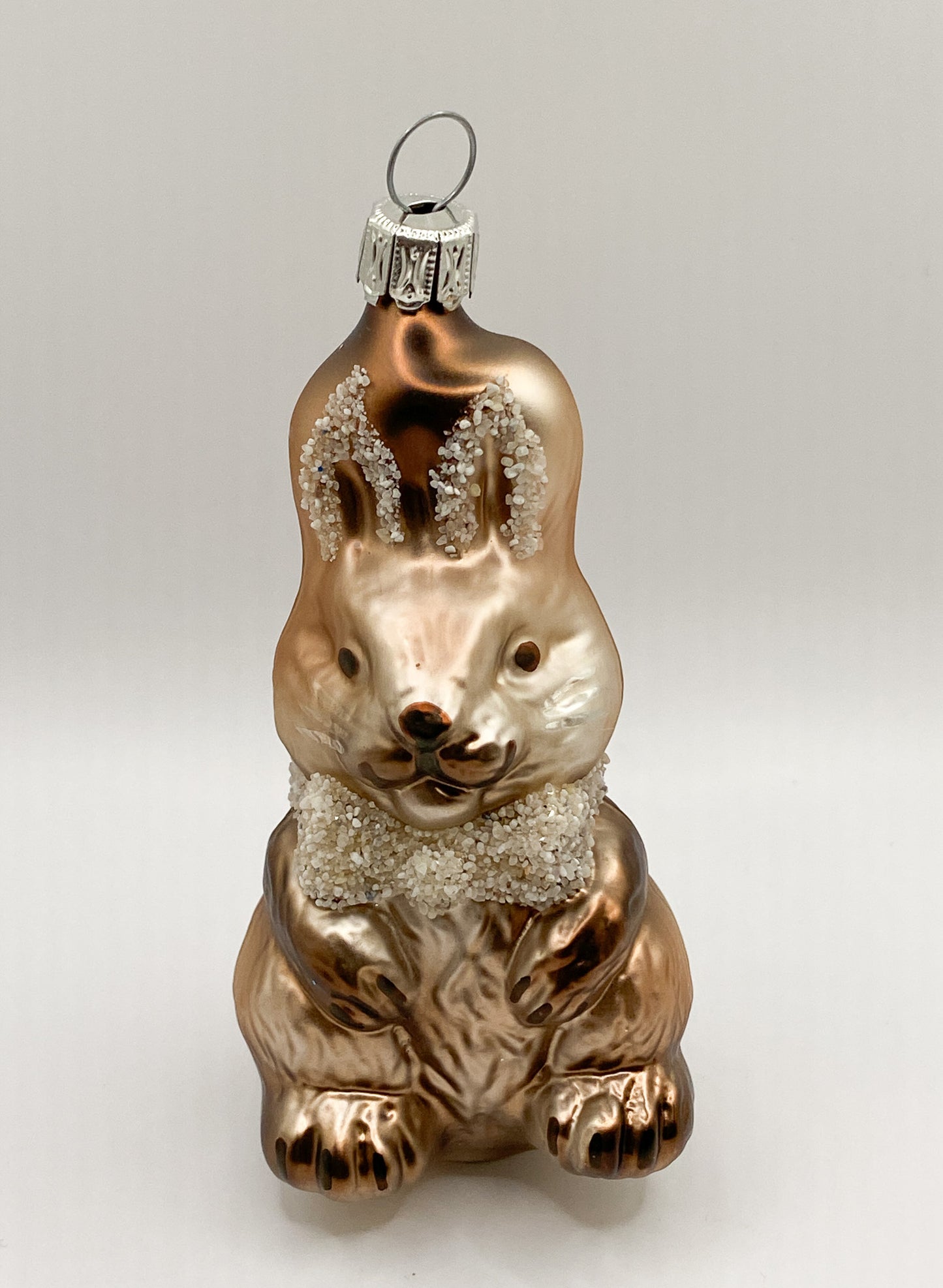 Sitting brown bunny with ribbon