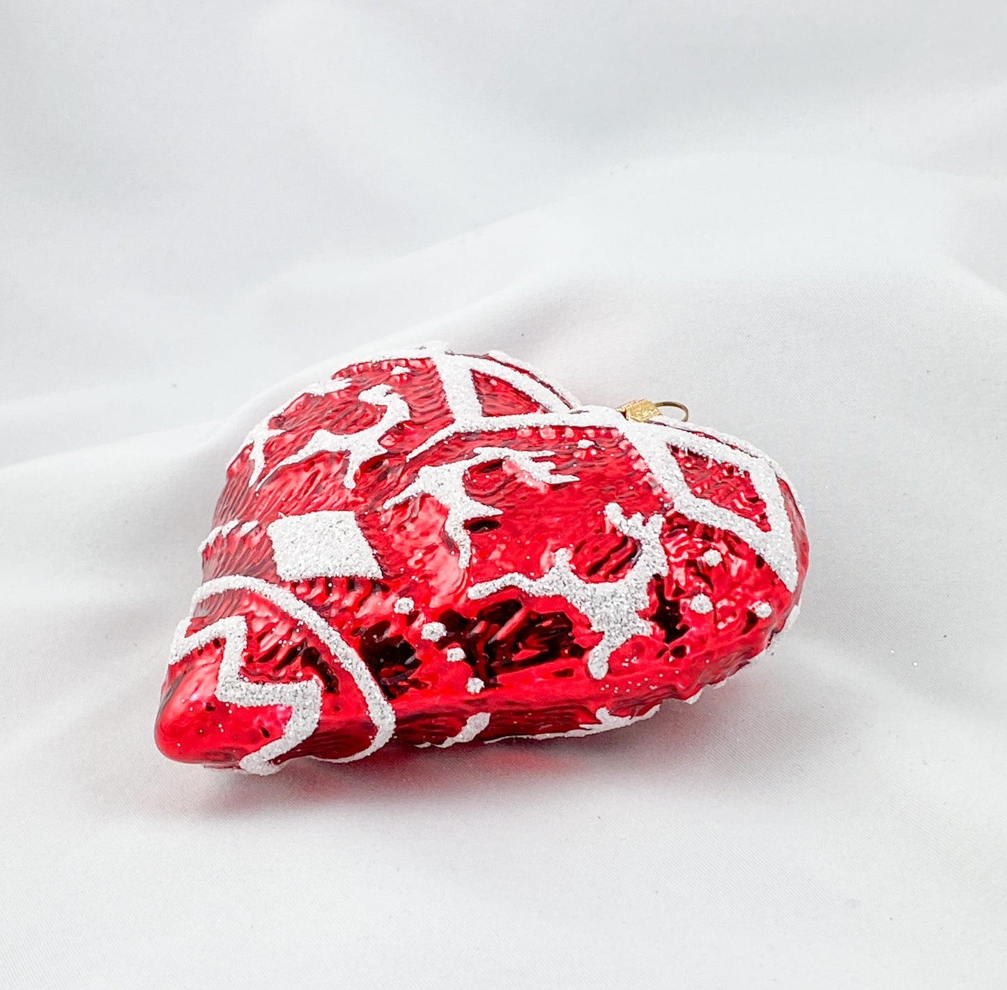 Rotes Herz mit Norweger-Pulli-Muster