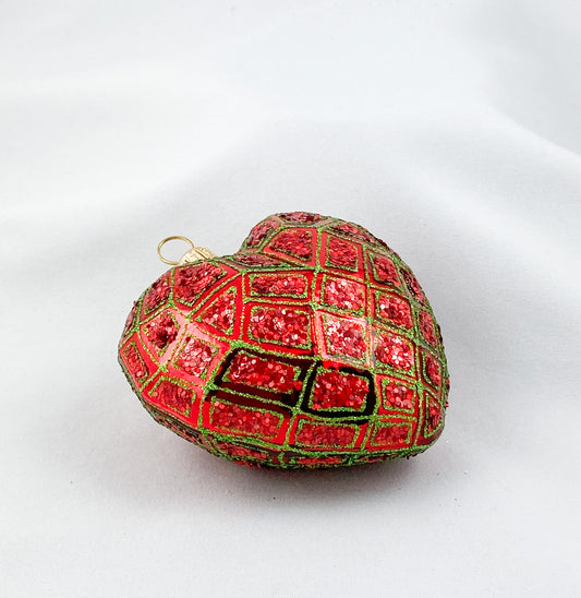 Rotes Herz mit geometrischem Muster und grünem Glitzer