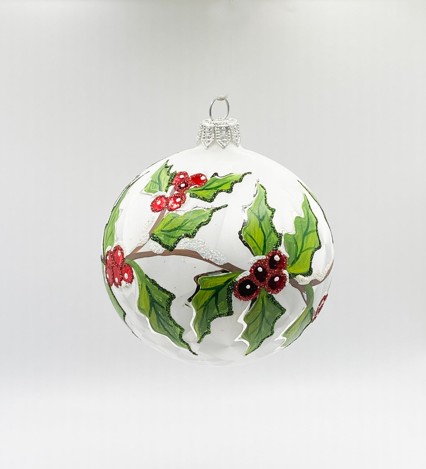 White ball with holly tendril decoration