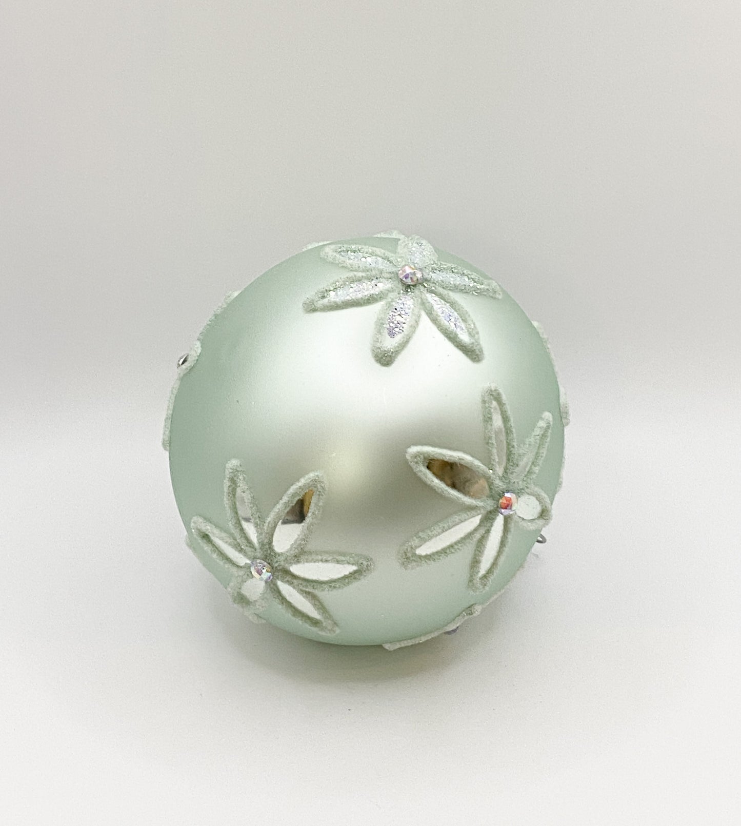 Ball mint green with white flowers