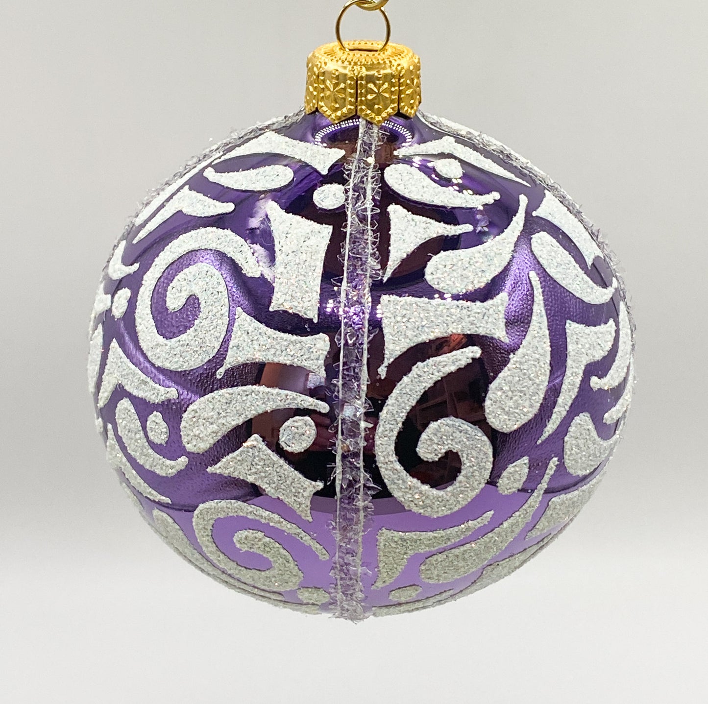 Ball shiny purple with white decoration