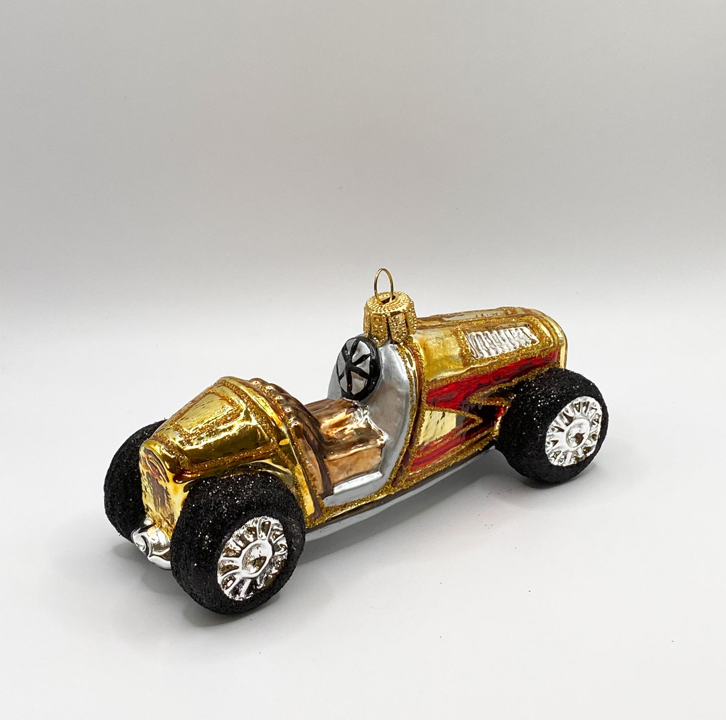 Goldenes Oldtimer Rennauto