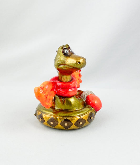 Schlange mit orangem Schal, AtlasArt