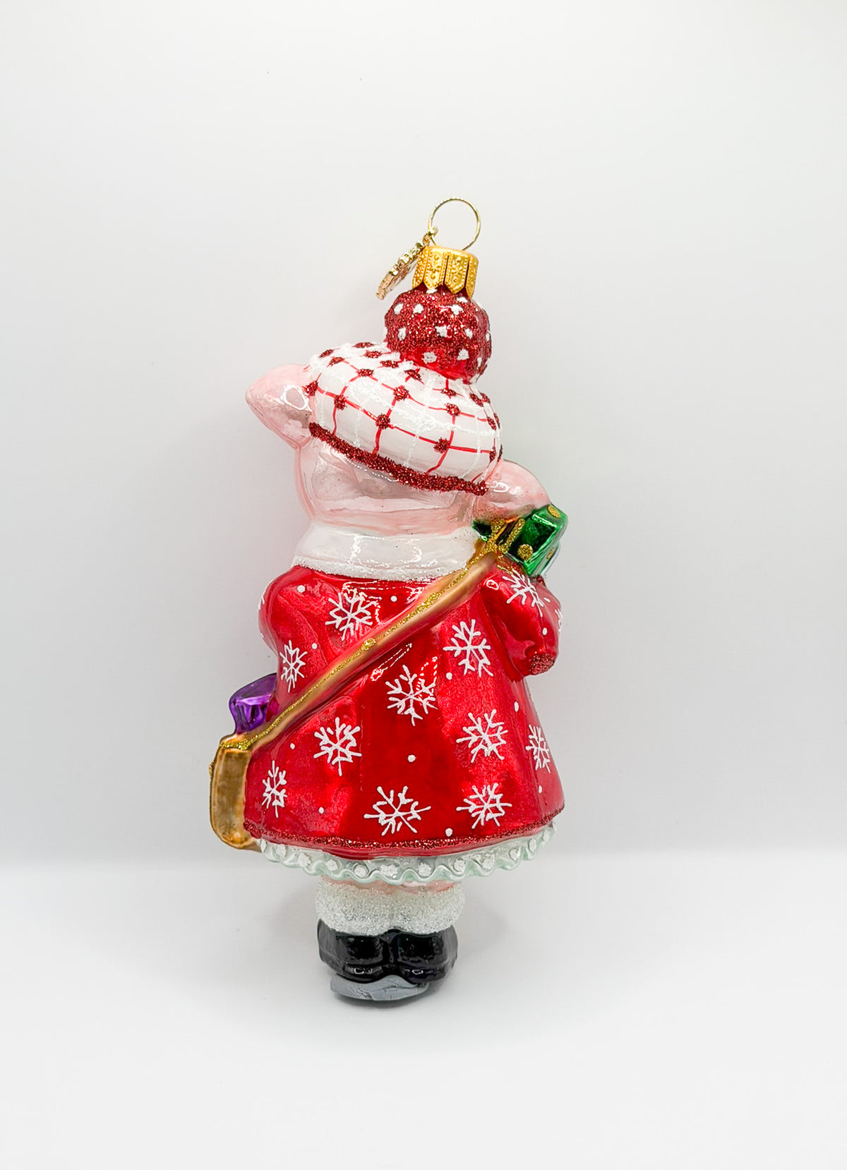 Schweinchen im Winterkleid bei den Weihnachts-Einkäufen