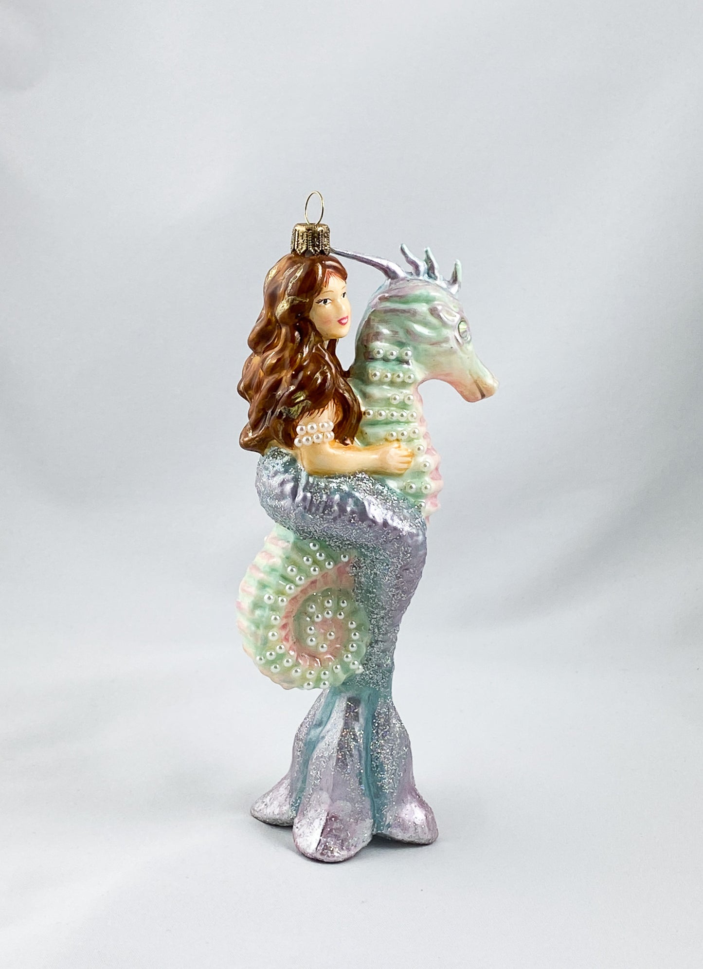 The mermaid rides on the seahorse, AtlasArt