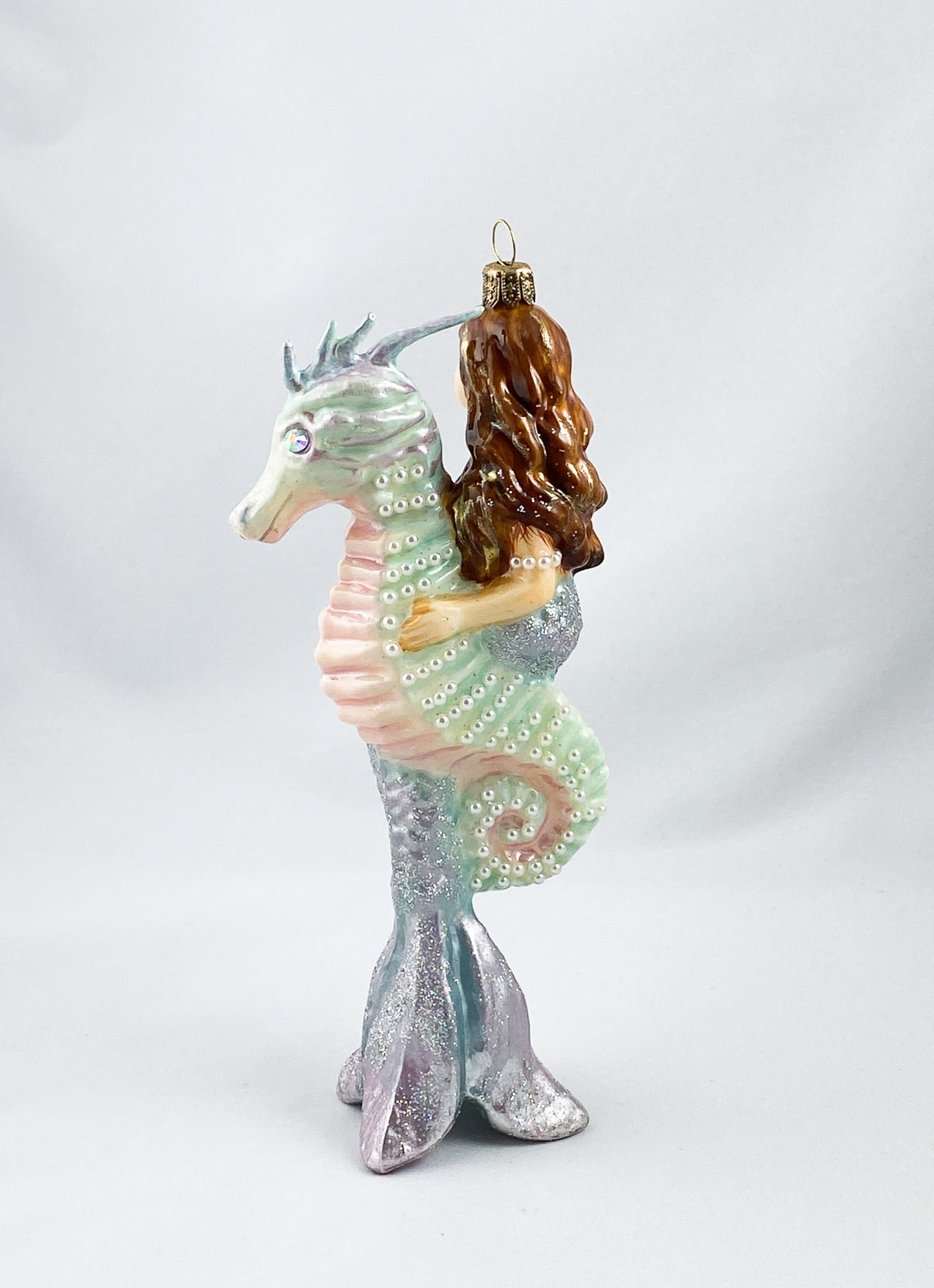 The mermaid rides on the seahorse, AtlasArt