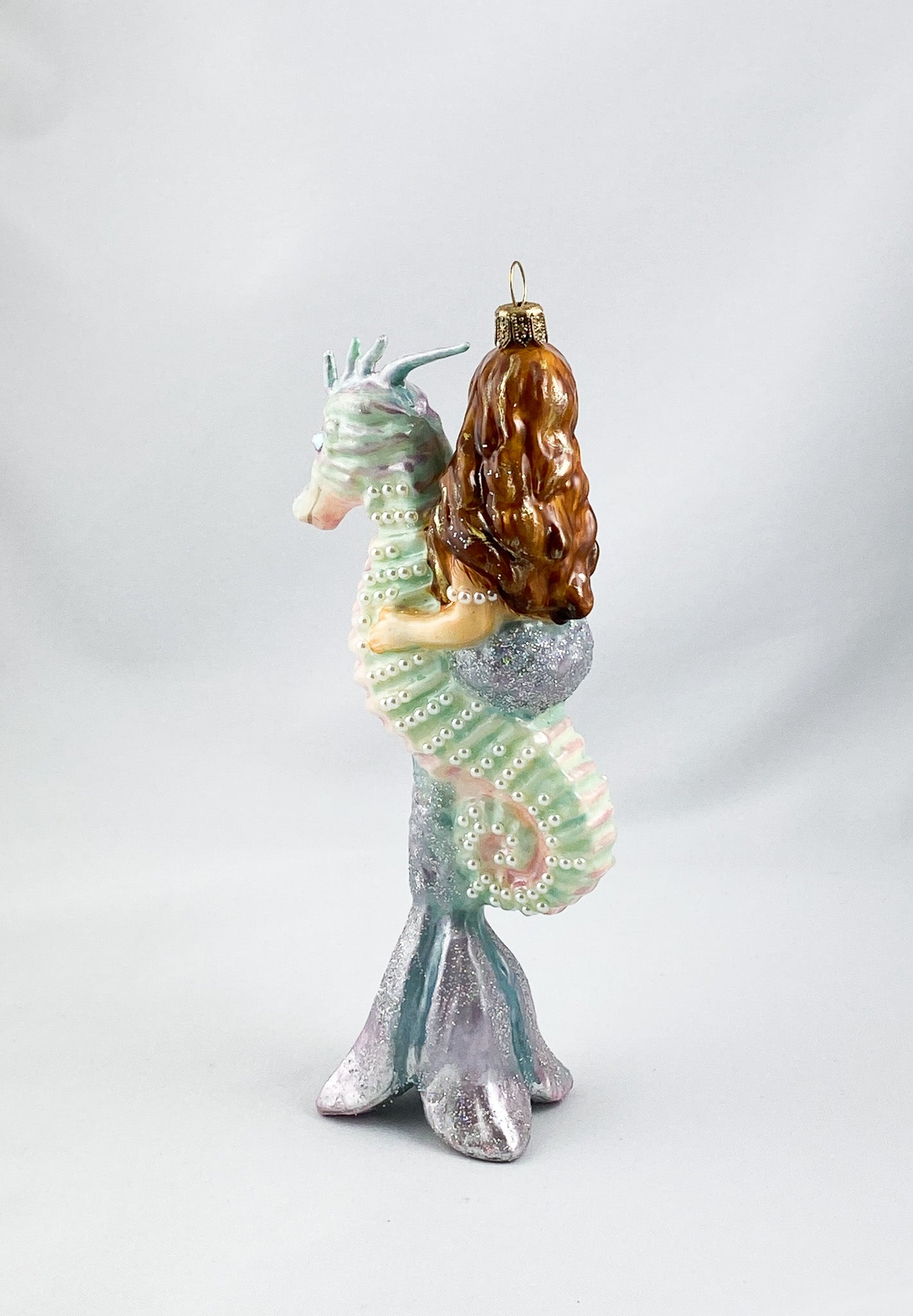 The mermaid rides on the seahorse, AtlasArt