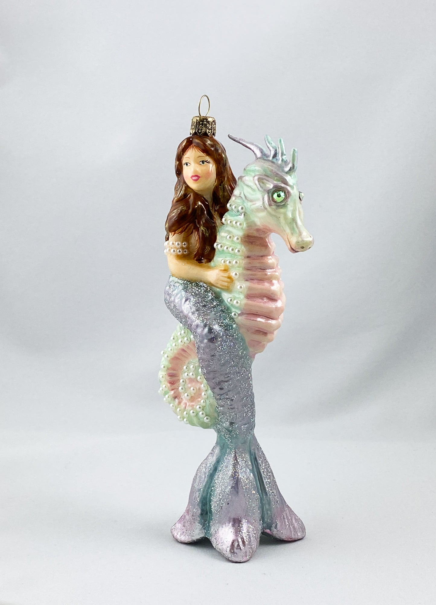 The mermaid rides on the seahorse, AtlasArt