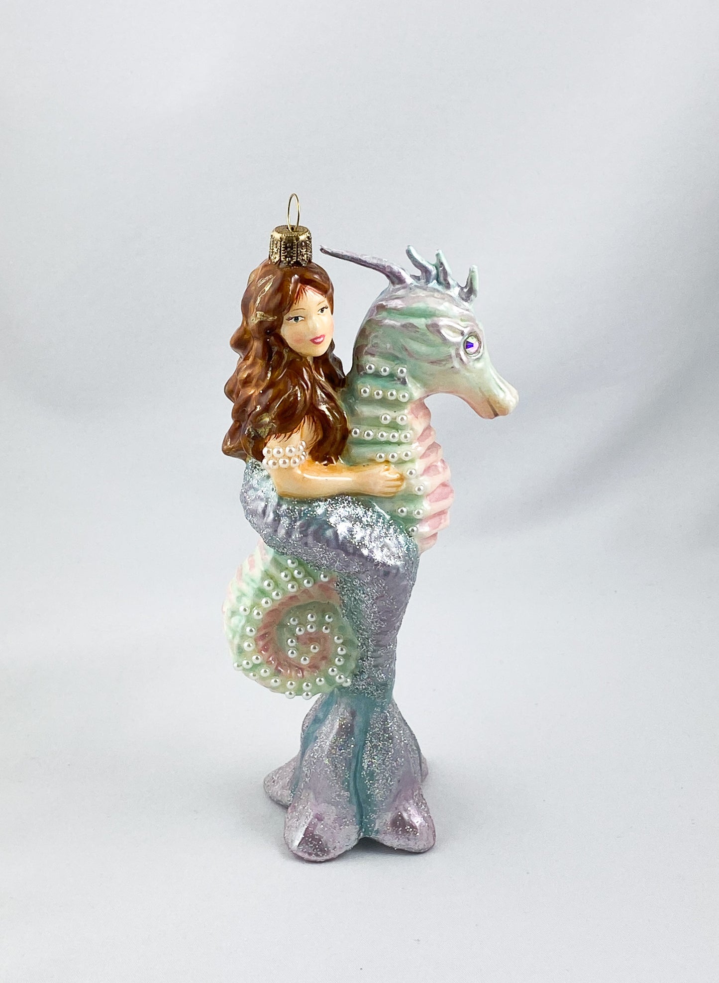 The mermaid rides on the seahorse, AtlasArt