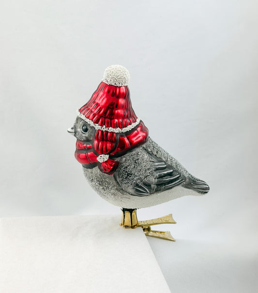 Mountain tit with red cap and red scarf on clip