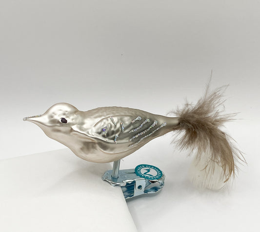 Vogel in warmem grau mit Glitzer