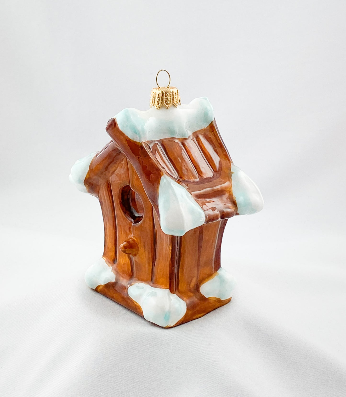 Verschneites Vogelhäuschen KOMOZJA MOSTOWSKI