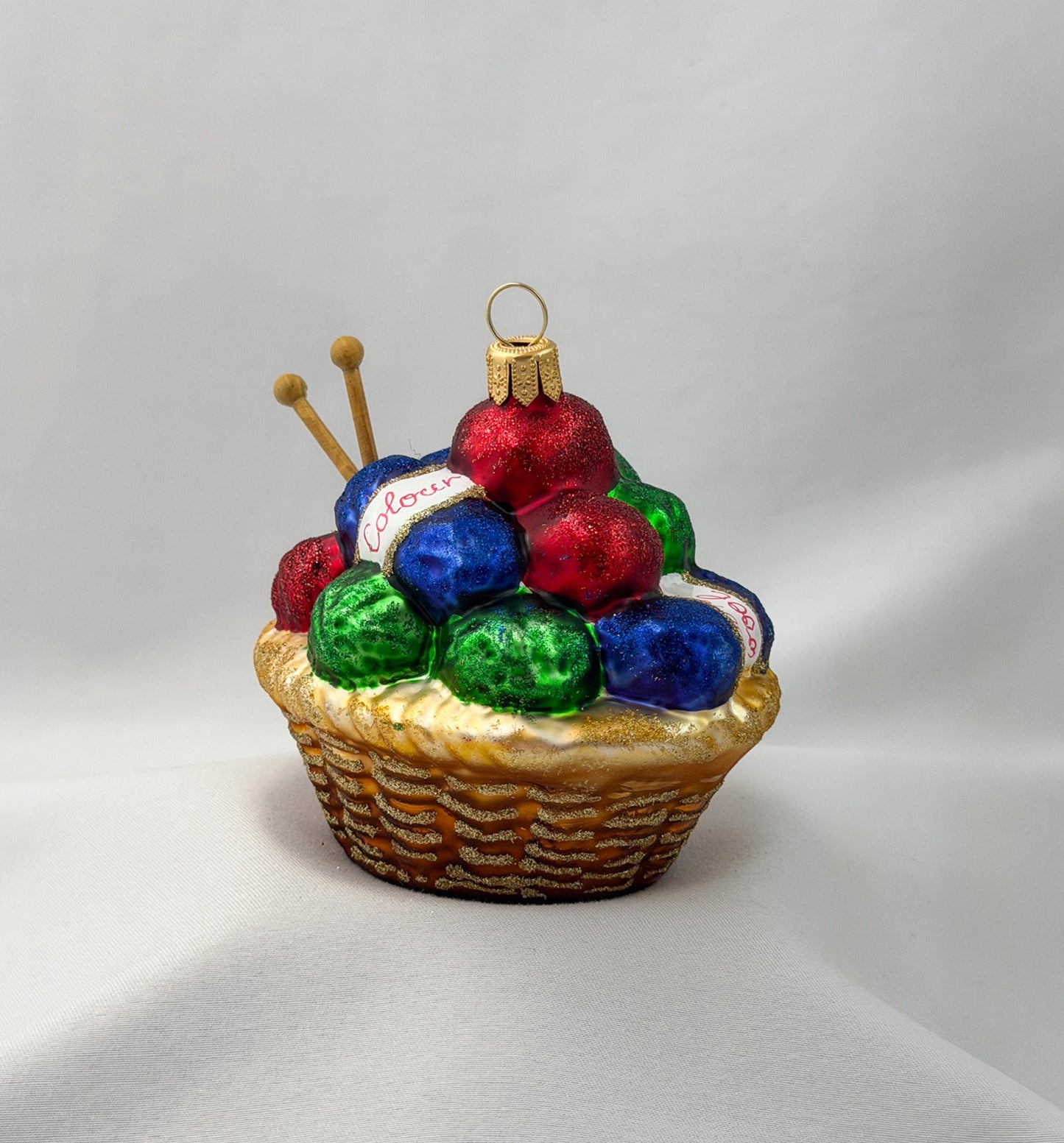 Knitted basket with many balls of wool