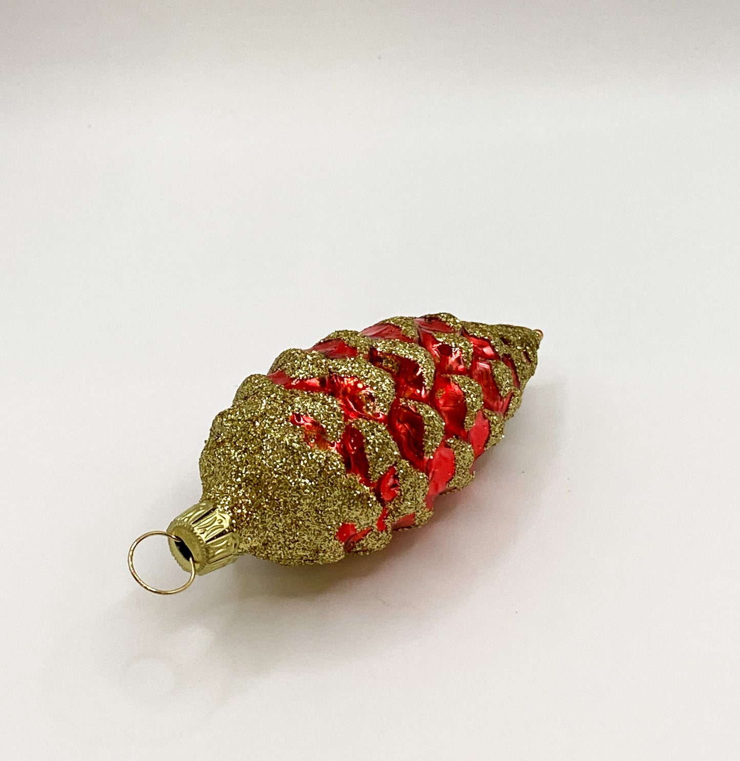 Small red cone with golden glitter