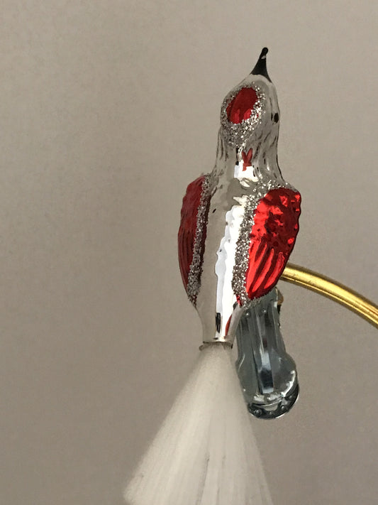 15610
