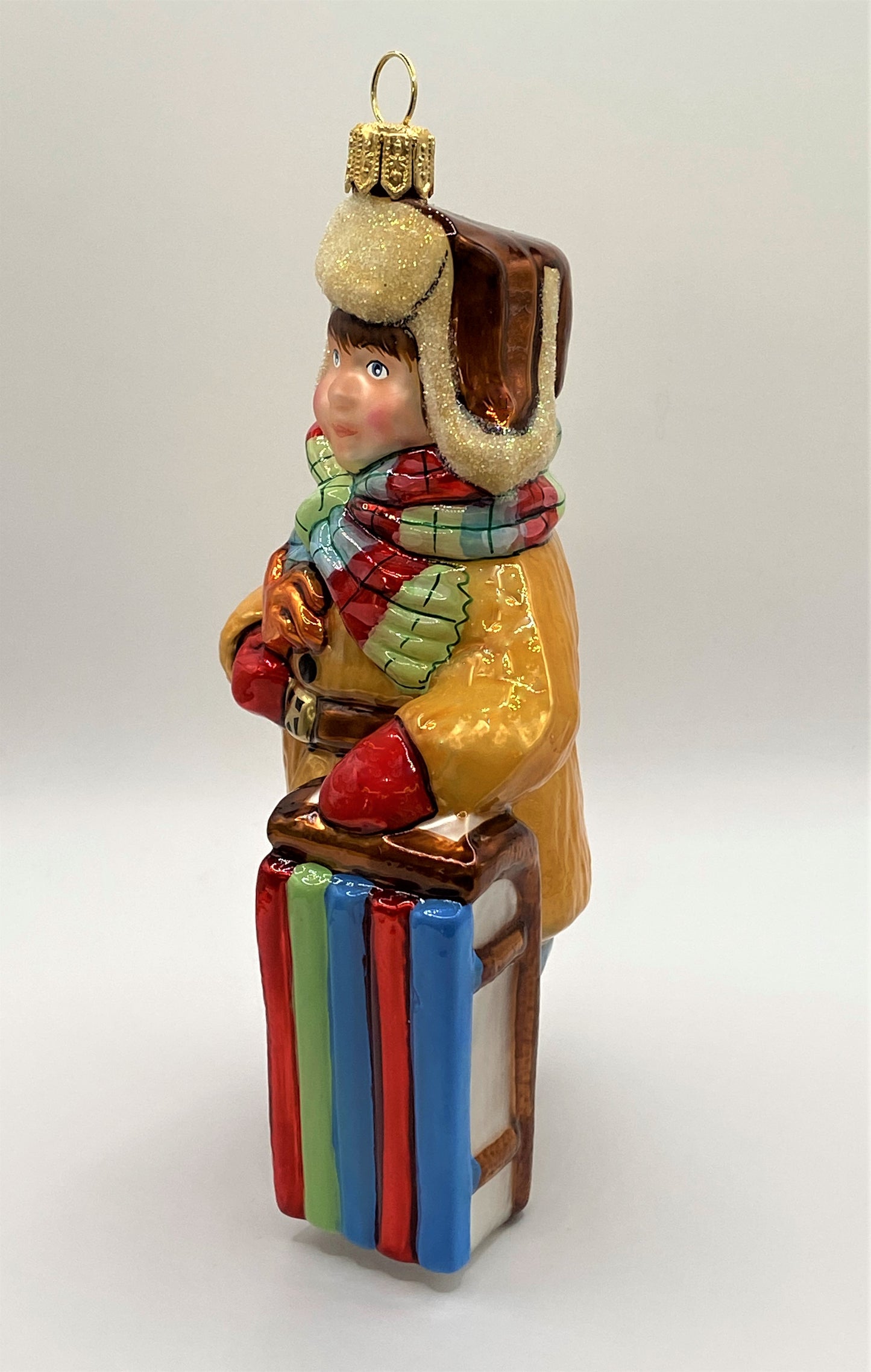 Baumschmuck-Christbaumschmuck-Junge-Pelzmuetze-Schlitten-weihnachts-deko-ch-Galerie-Luechinger-3