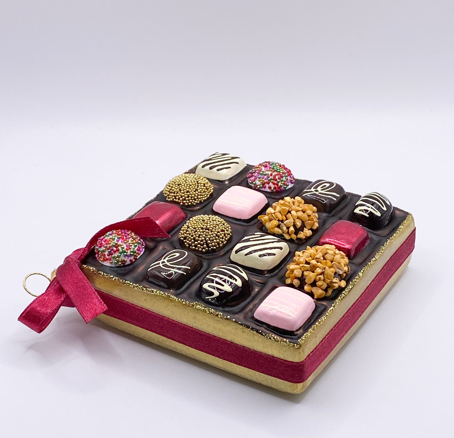 Baumschmuck-Christbaumschmuck-praline-konfekt-suess-schokolade-weihnachts-deko-ch-Galerie-Luechinger1