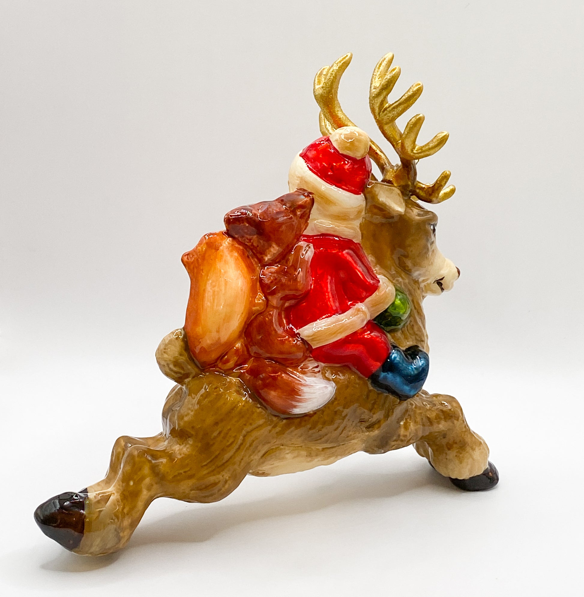 Baumschmuck-Christbaumschmuck-rentier-kind-santakostuem-fuchs-eichhoernchen-mostowski-komozja-weihnachts-deko-ch-Galerie-Luechinger3