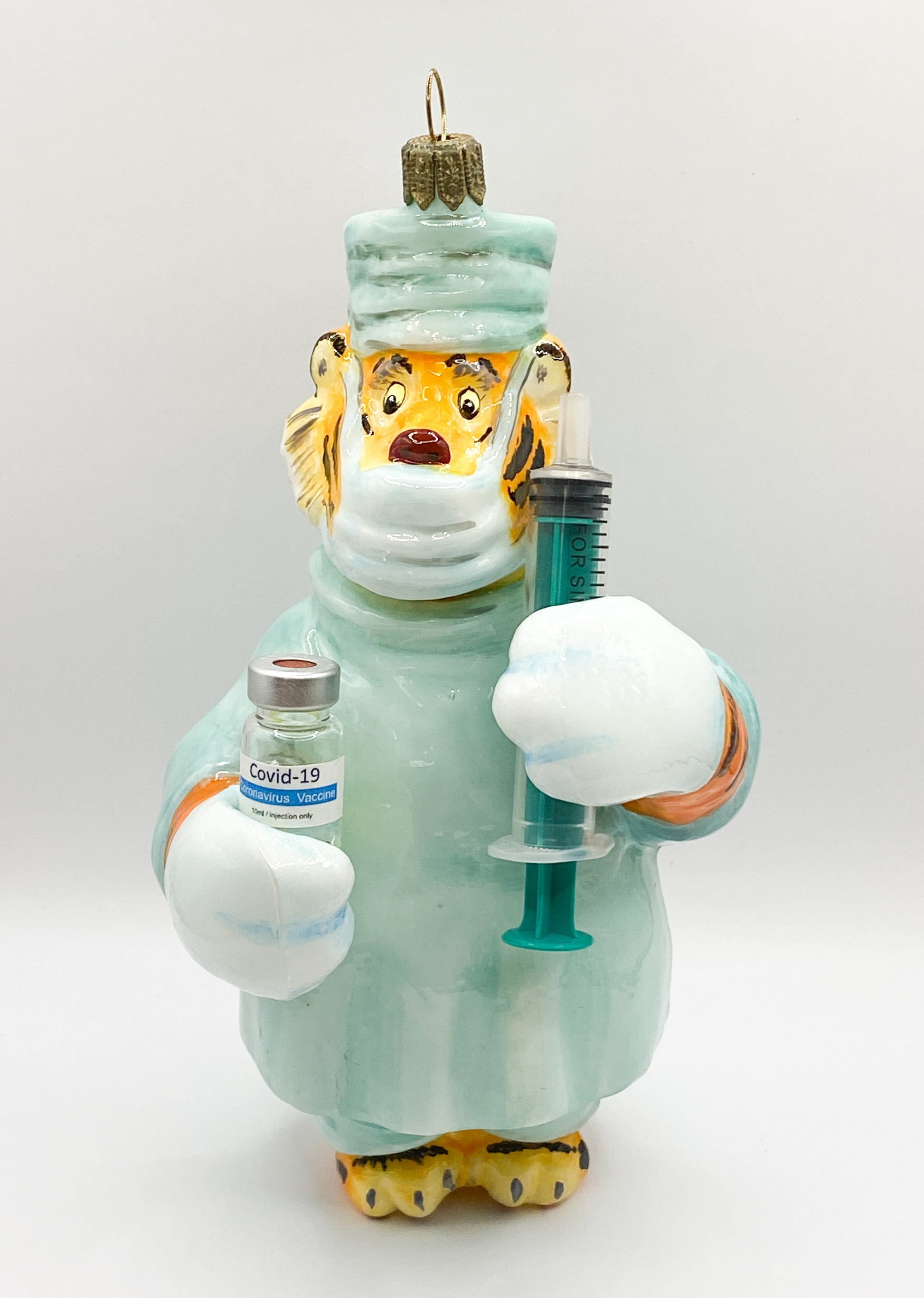 Baumschmuck-Christbaumschmuck-tiger-medizin-impfstoff-spritze-weihnachts-deko-ch-Galerie-Luechinger