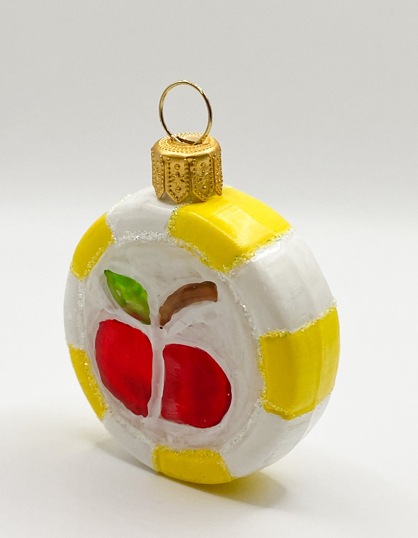 Colorful candy with red apple motif