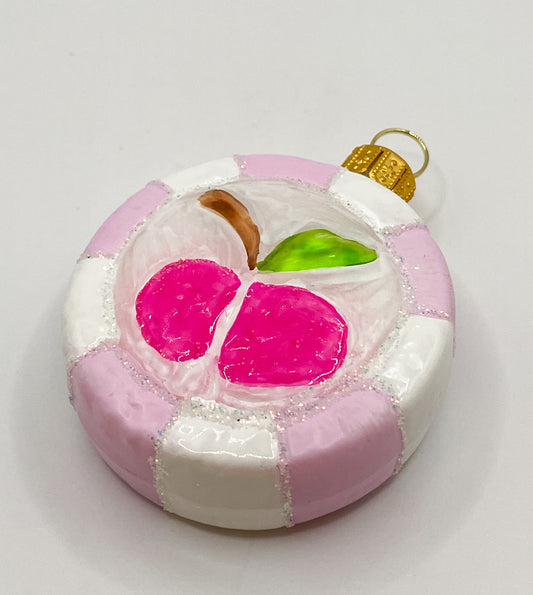 Rosa Bonbon mit Apfel-Motiv