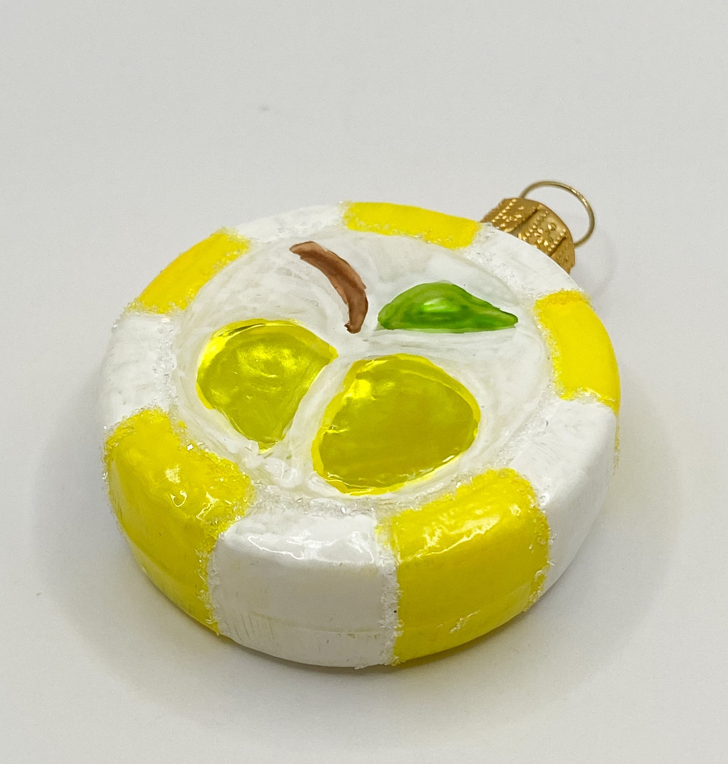 Yellow candy with apple motif