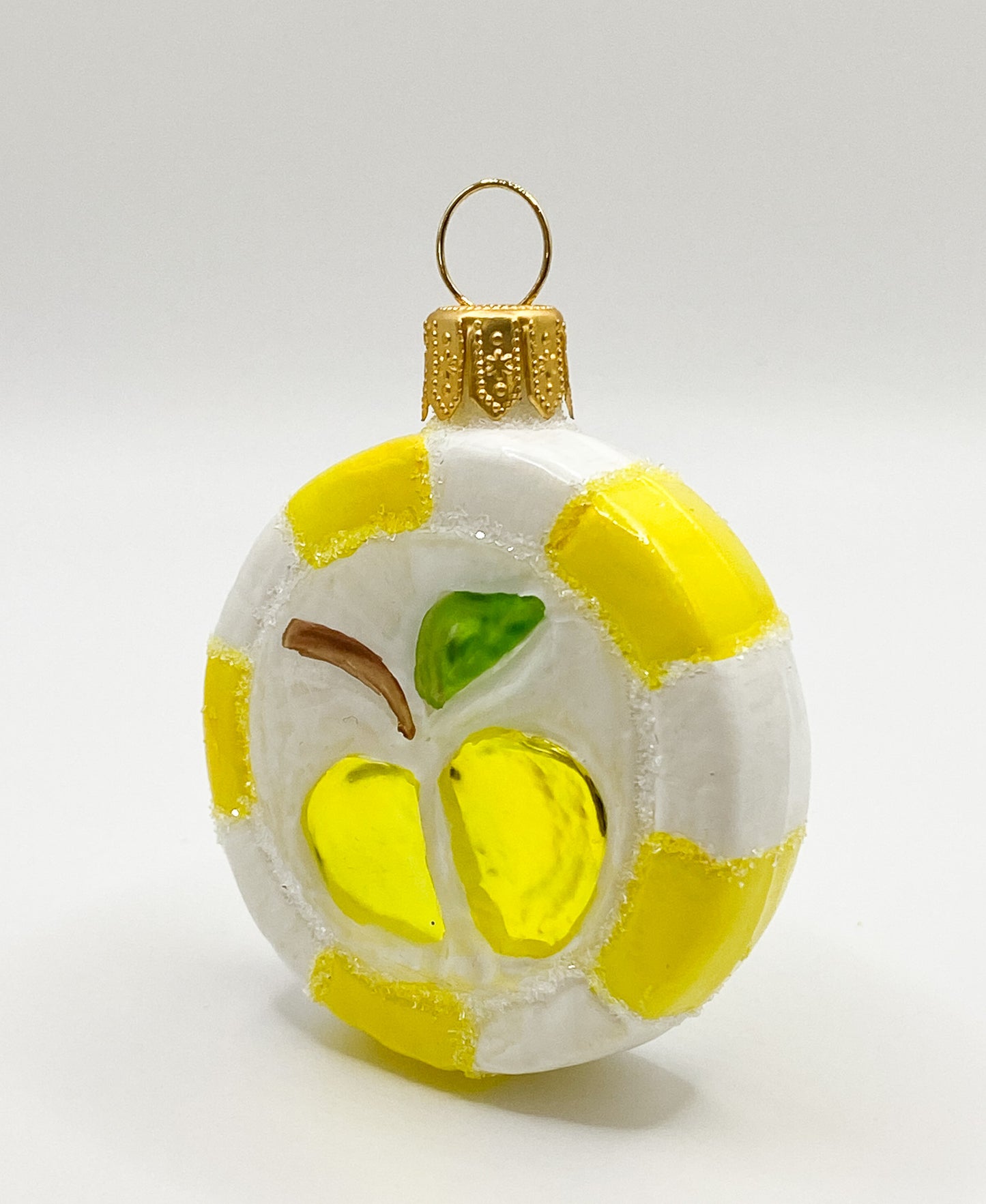 Yellow candy with apple motif