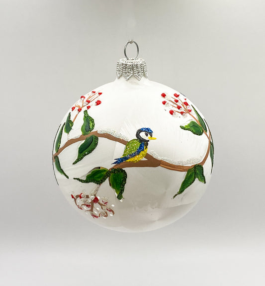 White ball with blue tits on leaf tendrils