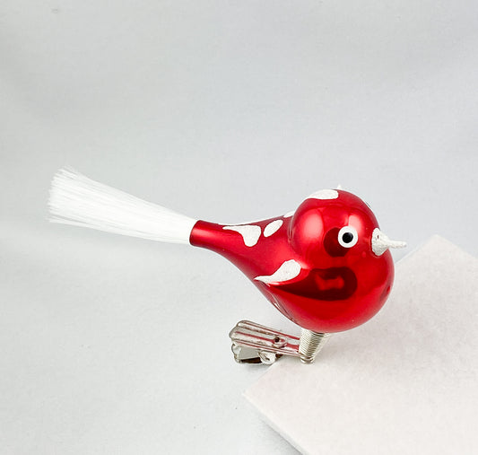 Lustiger rotes Vögeli mit weissem Dekor und weissem Schwanz