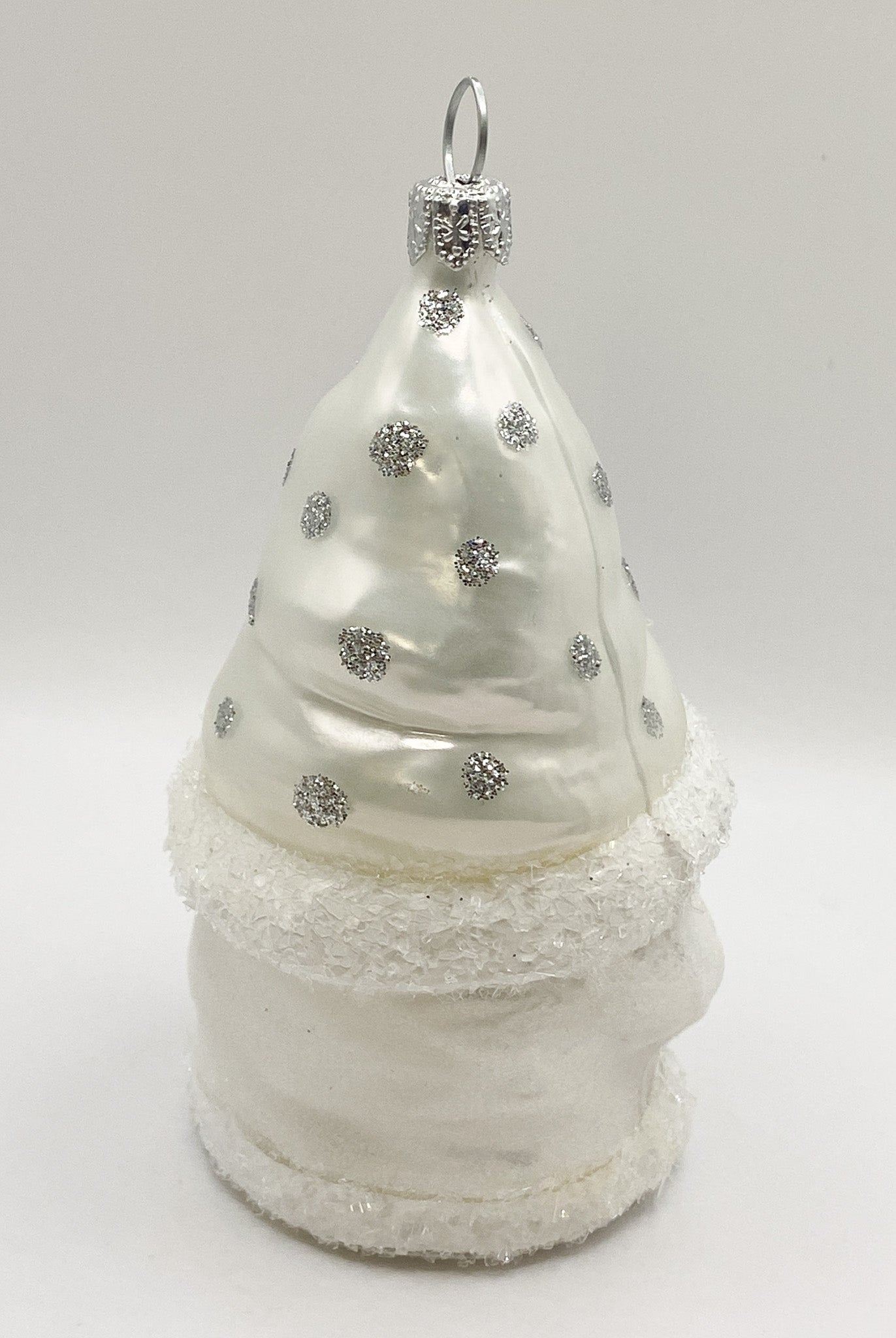 Gnome in white spotted robe